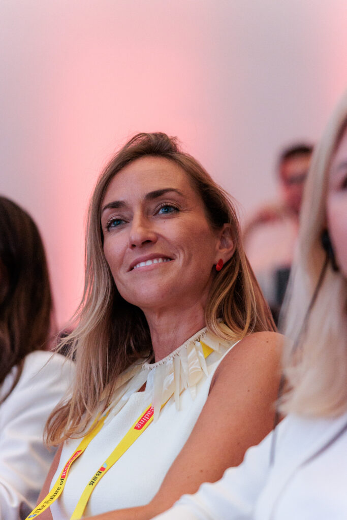 Portrait of Silvia Pazos Rodriguez smiling in the audience at Book 2.0
